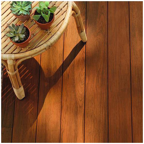 exterior wood deck with patio table and plants